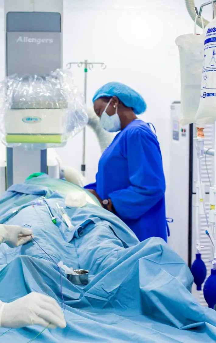 A Cardiocare cath-lab clinician supporting a minimally invasive cardiac procedure